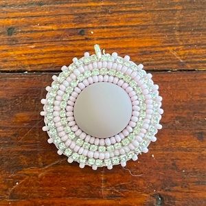 Beadwork pendant by Indigenous artist